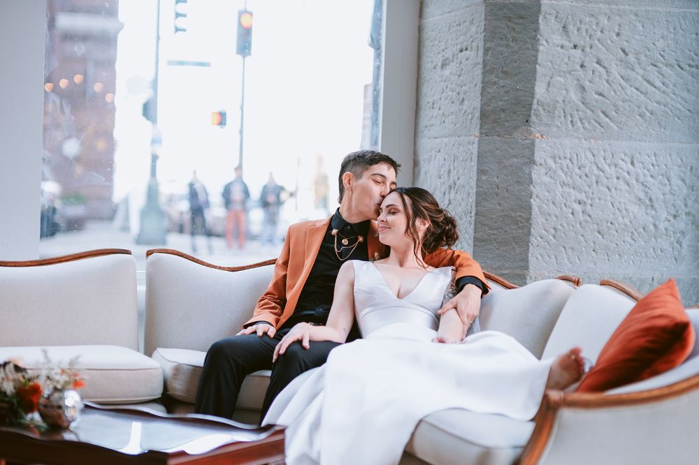 Newlyweds share a kiss at their Seattle wedding