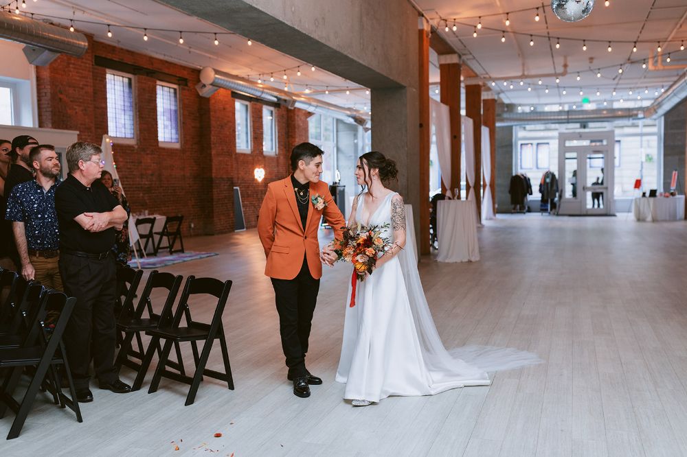 Riley and Alex share their first dance at their Seattle wedding
