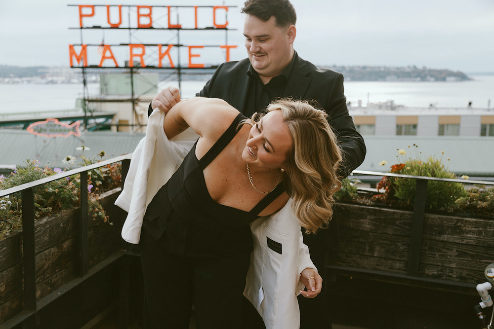 Couple standing on a rooftop on their wedding day