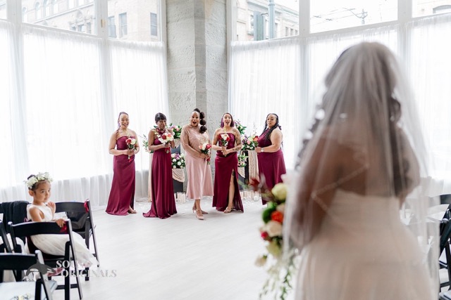 First look with bride and bridesmaids at THE 101