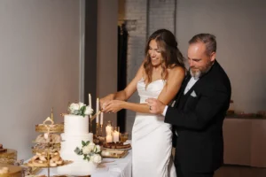 Bride and groom cutting their cake at THE 101 in Seattle, WA