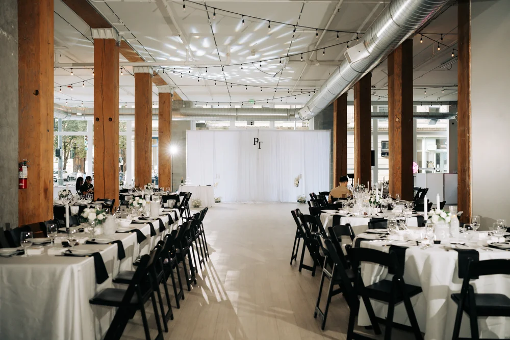 Wedding reception at THE 101 Seattle featuring statement draping décor