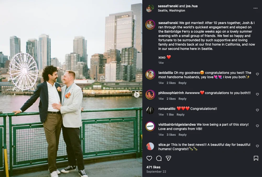 Couple posing for a winter engagement photo at the Seattle waterfront with city skyline in the background
