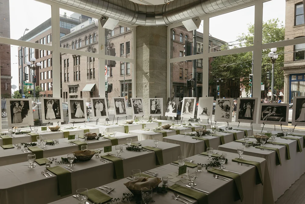 Photos of family weddings displayed at a wedding at THE 101