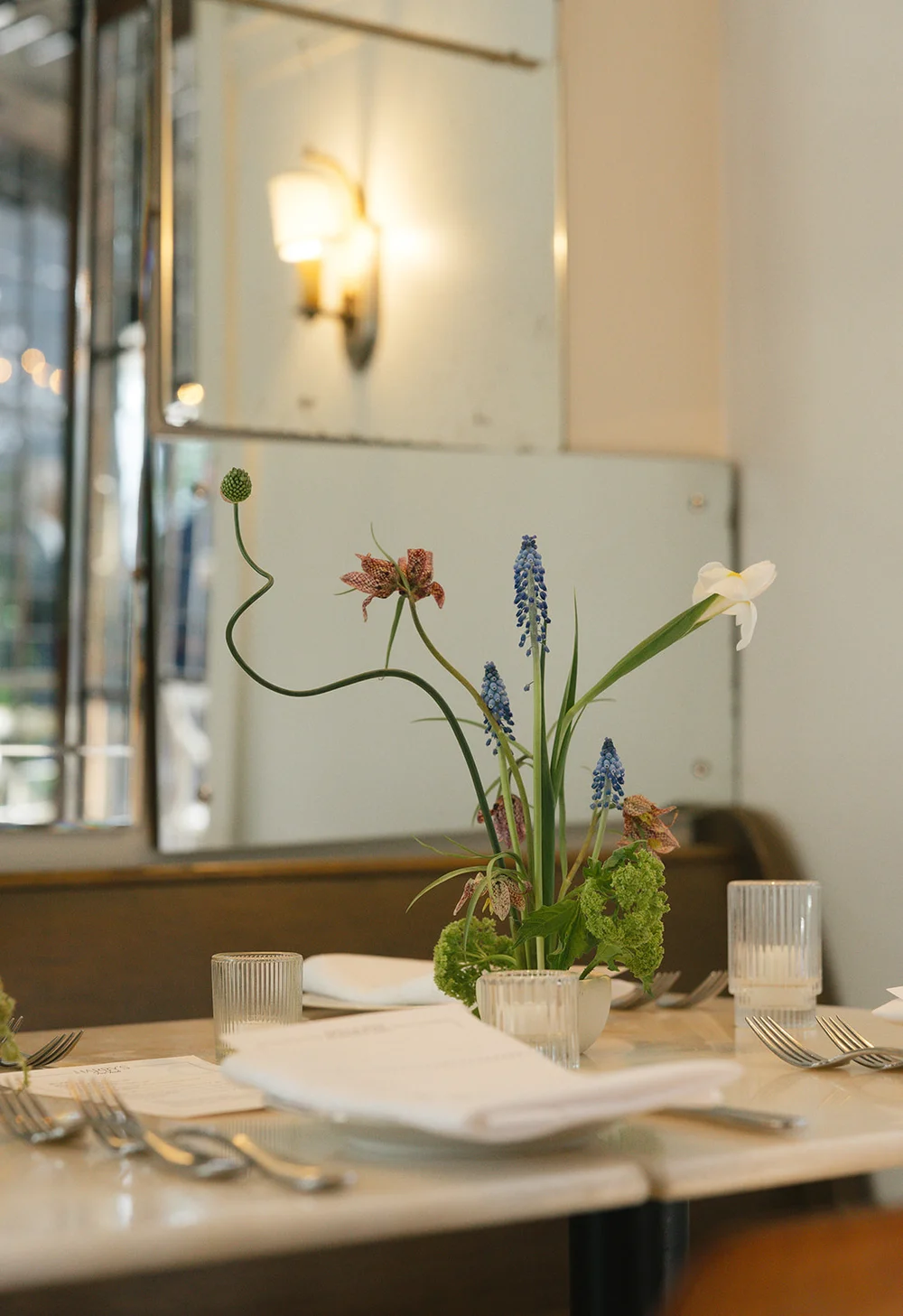 Spring wedding flowers in Seattle featuring fritillaria, allium, and iris