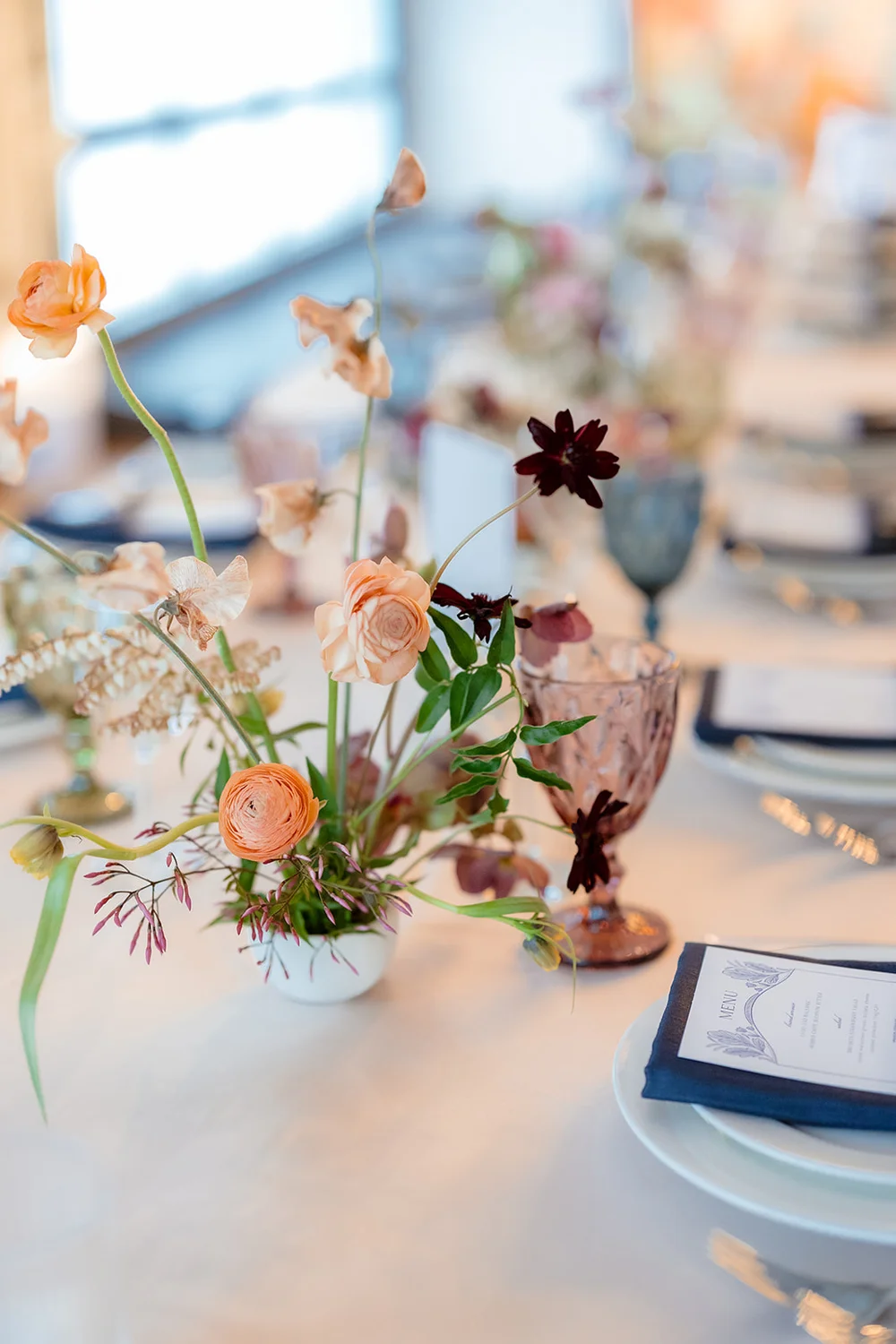 Centerpiece with peach ranunculus 