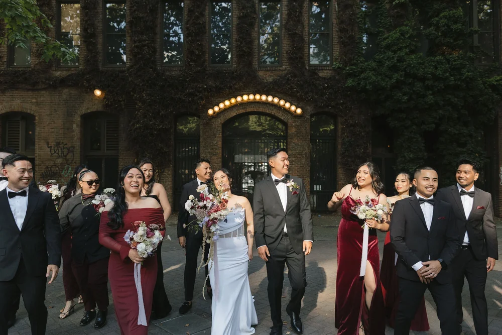 Wedding party walking through Pioneer Square, Seattle